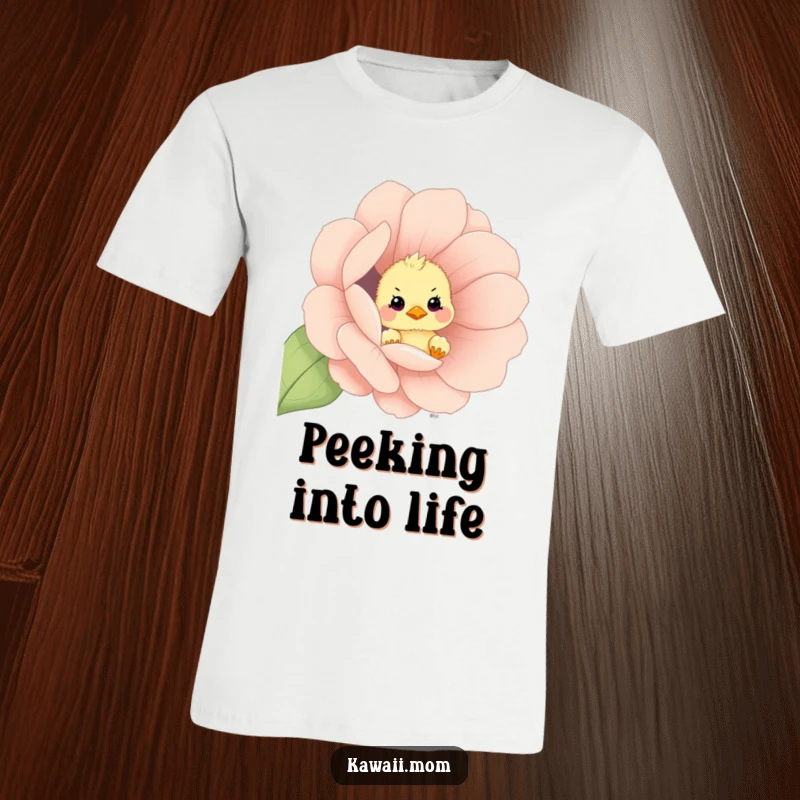 Funny curious chick peeking out from an oversized flower on this comfortable t-shirt, a humorous and sweet gift.